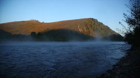 Mountain river in fog Stock Footage 54921736