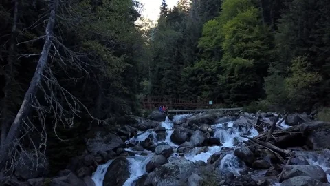 Mountain river goes down the slope Stock Footage 96769213