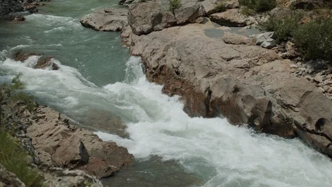 Mountain river goes through the granite canyon Stock Footage 112734249