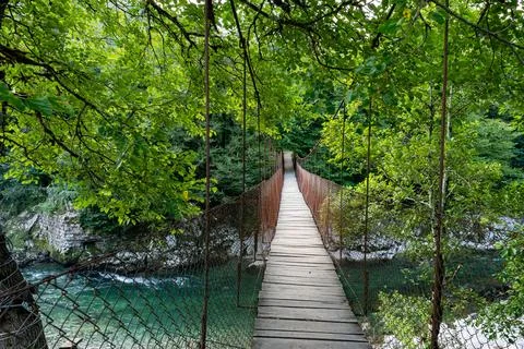Mountain river hanging monkey bridge hiking Stock Photos