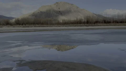 Mountain with river in ice, winter, 4k,  Kamloops Stock Footage 233749733
