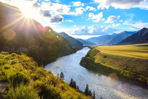 Mountain river Katun on sunset Stock Photos