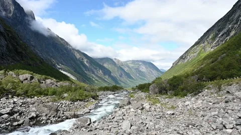 Mountain river leading through the forested valley near Trollstigen, Norway, 4K Stock Footage 159831710