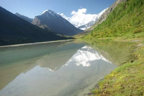 The mountain river in the mountains. Current through the gorge the river. S.. Stock Photos
