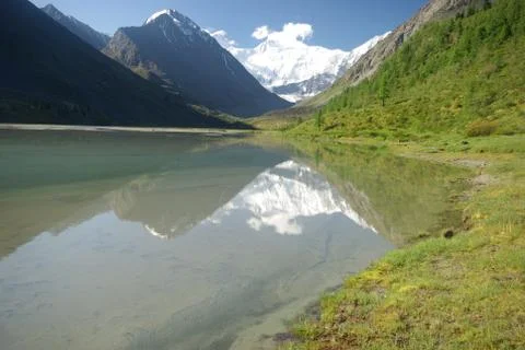 The mountain river in the mountains. Current through the gorge the river. S.. Stock Photos