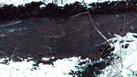 Mountain river passing trough snowy  landscape. Stock Footage 237774157