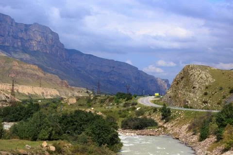 Mountain river with a rapid flow in the Caucasus Range. Stock Photos