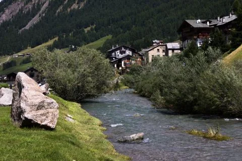 A mountain river with rock in it Stock Photos