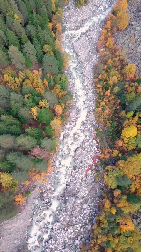 Mountain river with rocks and rapids from bird's-eye view. Shooting from drone Vidéo 164602261