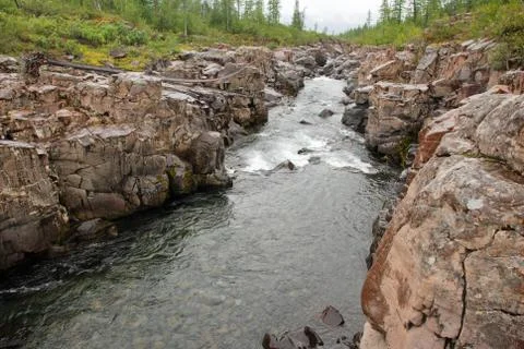 Mountain river in the rocks. Stock Photos