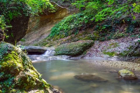 Mountain river on the rocks Stock Photos