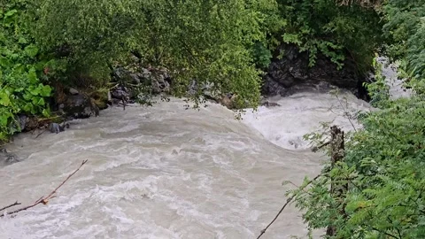 Mountain River Rushing Down the Mountain Slope Stock Footage 330634456
