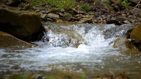 Mountain river slow motion Stock Footage 79290953