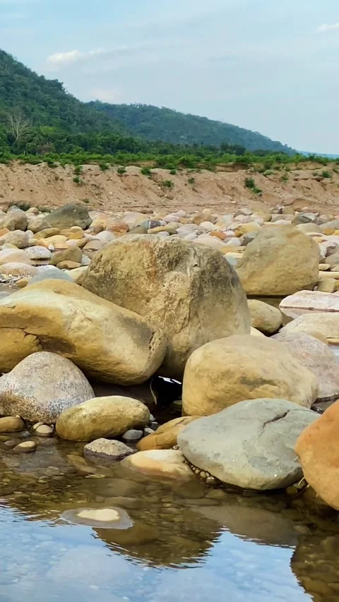Mountain River Stream Flowing Over Large Boulders Near Meghalaya Hills In Stock Footage 345377686
