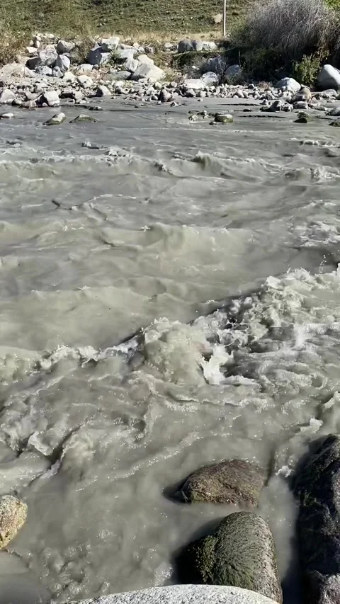 Mountain river stream with sediment Stock Footage 251663714