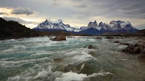 Mountain river at sunset with a view of the mountains. Torres del Paine, Chile Stock Footage 83819383