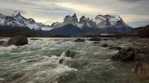 Mountain river at sunset with a view of the mountains. Torres del Paine, Chile Stock Footage 88123092