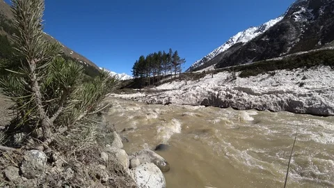 Mountain river view with snowy mountains background Video stock 90492153