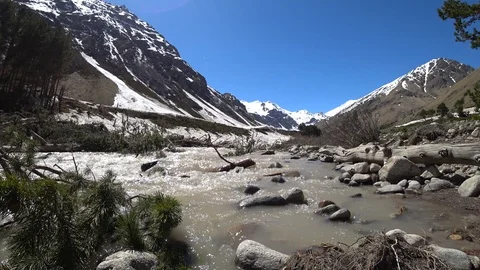 Mountain river view with snowy mountains background Stock Footage 90492321