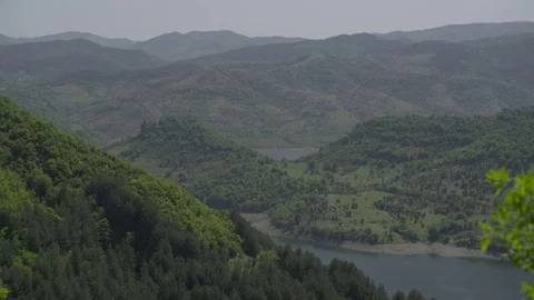 Mountain River View in Spring 4K Stock Footage 76556277