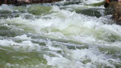 Mountain river water flow in powerful waterfall, video background. Stock Footage 154263405