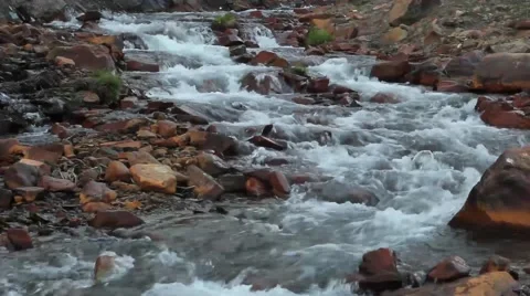 Mountain River Water flowing over rocks at evening Stock Footage 41465404