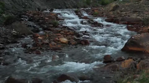 Mountain River Water flowing over rocks at evening Stock Footage 41465408
