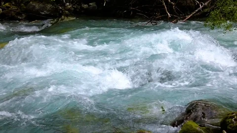 Mountain river water with slow motion closeup Stock Footage