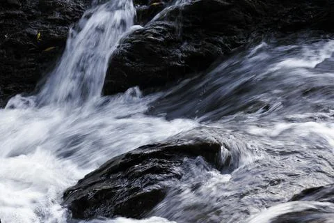 Mountain river wave texture, close-up, long exposure Stock Photos
