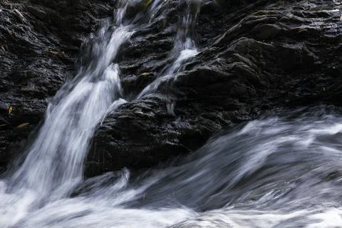 Mountain river wave texture, close-up, long exposure Stock Photos