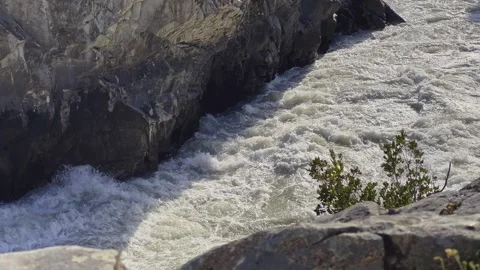 Mountain river in the wild. A powerful stream of water flowing through stone Stock-Footage 247777220