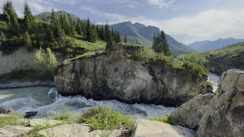 Mountain river in the wild. A powerful stream of water flowing through stone Stock-Footage 247842871
