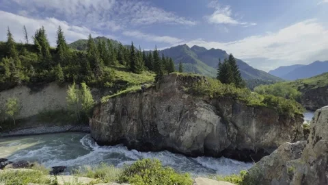 Mountain river in the wild. A powerful stream of water flowing through stone Stock-Footage 248308397