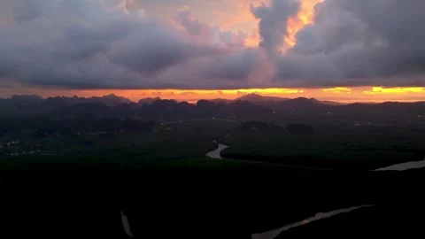 Mountain river winding through mangroves at golden sunset Stock-Footage 341327881