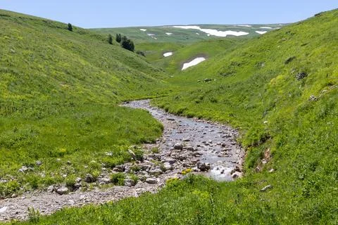 Mountain rivers are the sources, a spring of clean drinking water in nature, Stock Photos