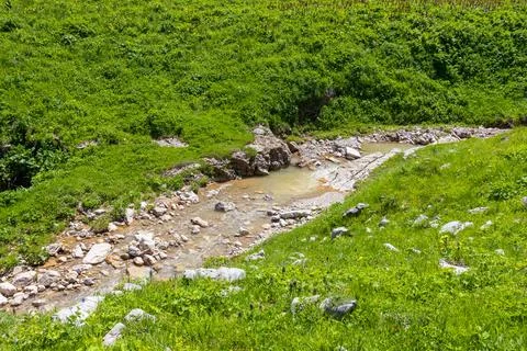 Mountain rivers are the sources, a spring of clean drinking water in nature, Stock Photos