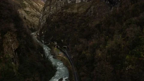Mountain road along the gorge and a river in Abkhazia Stock Footage 201871199