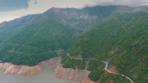 Mountain road along the river Stock Footage 76428423