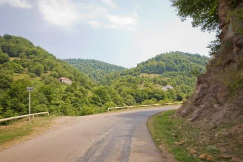 Mountain road between forests . Winding mountain road . A road in Azerbaijan  Stock Photos