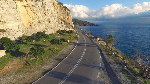 Mountain road, тhe camera flies over the road Stock Footage 77805722