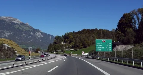 Mountain road, Cinema 4k view driving on a alpine road, towards luzern and zu Stock Footage 83094090