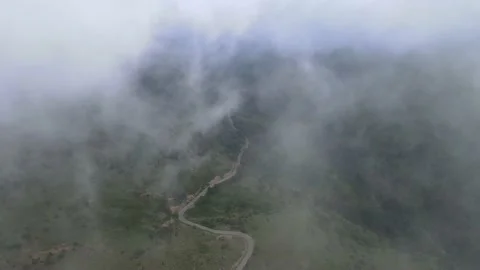 Mountain road in the clouds Video stock 137545341
