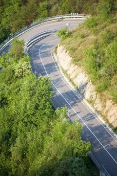 Mountain road cyclist Stock Photos