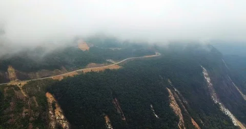 Mountain road with fog Stock Footage 88347329