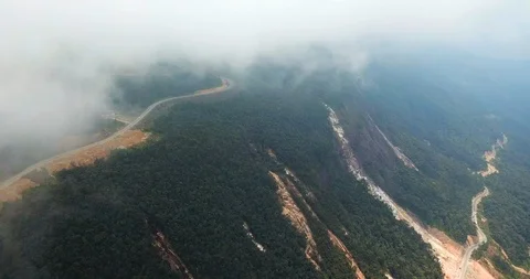 Mountain road with fog Stock Footage 88347426