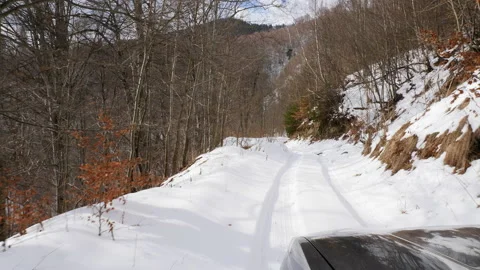 Mountain road full of snow. Slow motion Video stock 211709048