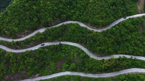 Mountain Road Journey Through Curving Scenic Highland Terrain by Car Stock Footage 341874657