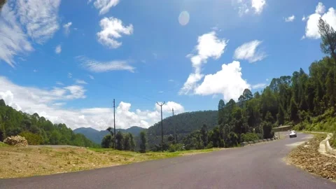 Mountain road shot from the front of car in uttrakhand Video stock 220413514
