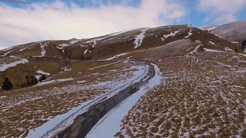 Mountain road in the snowy mountains Bucegi Stock Footage 74169591