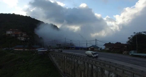 Mountain road surrounded by cloud, aerial pedestal shot, South East Asia Stock Footage 81336712